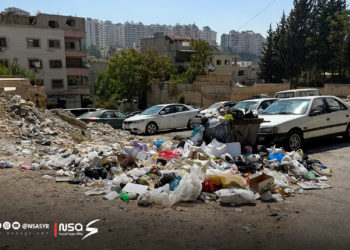 انتشار النفايات في حي دمر
