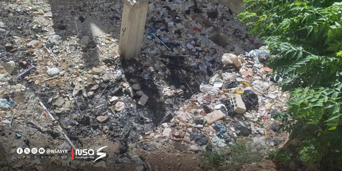 عقار مخالف يتحول إلى بؤرة تلوث في حي الفيحاء بحماة.. “سوريا الجديدة” ترصد مطالبات الأهالي بإنقاذ الحي