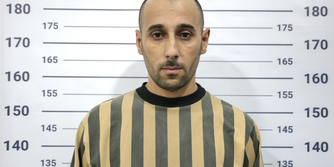 حسن مرعي حسن الحسين، أحد سجاني سجن صيدنايا