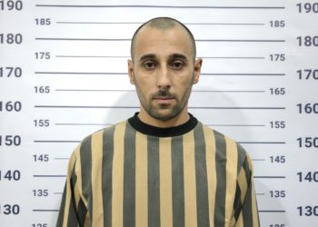 حسن مرعي حسن الحسين، أحد سجاني سجن صيدنايا