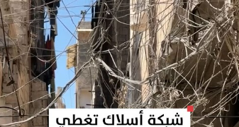 تشابك للأسلاك فوق شوارع حي الزهور في دمشق وسط مخاوف من المخاطر التي قد تنجم عنها